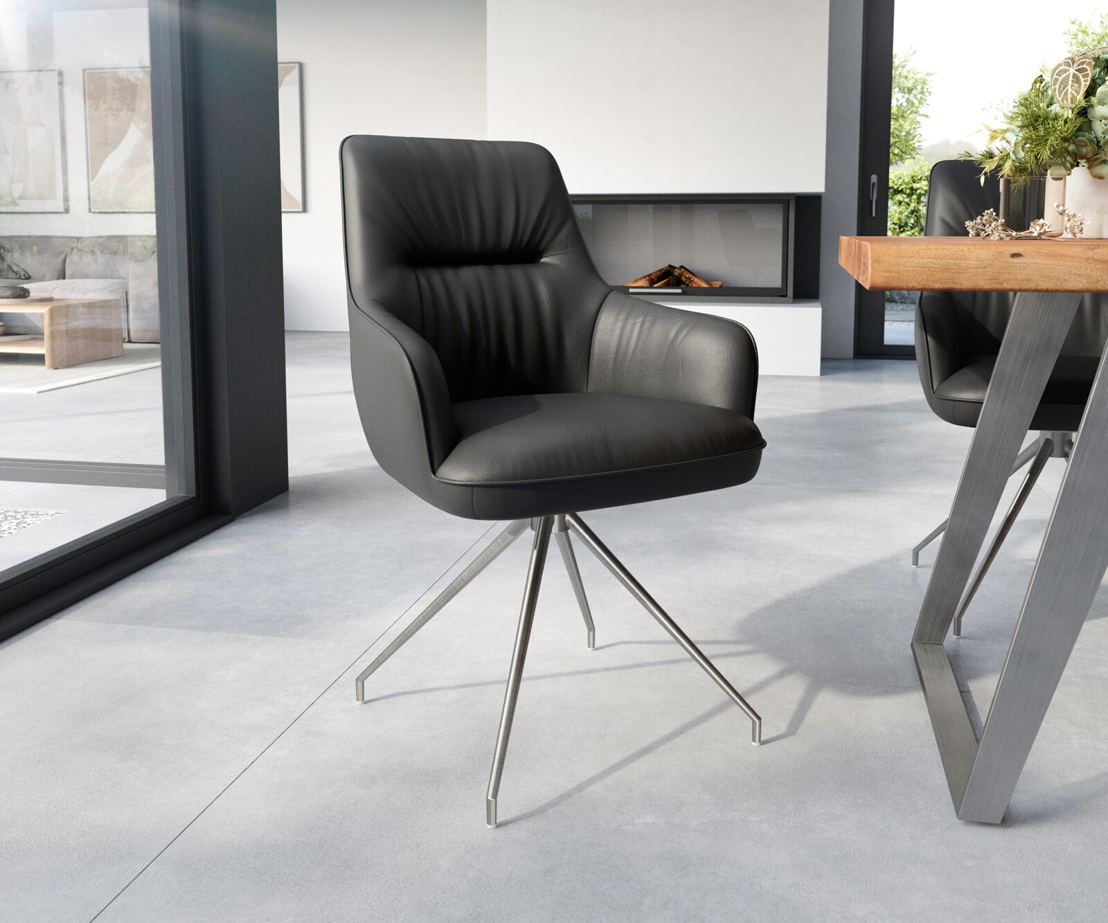 Chaise-de-salle-à-manger Zelia-Flex avec accoudoirs cuir de vache noir pied croisé conique acier inoxydable brossé ressorts ensachés