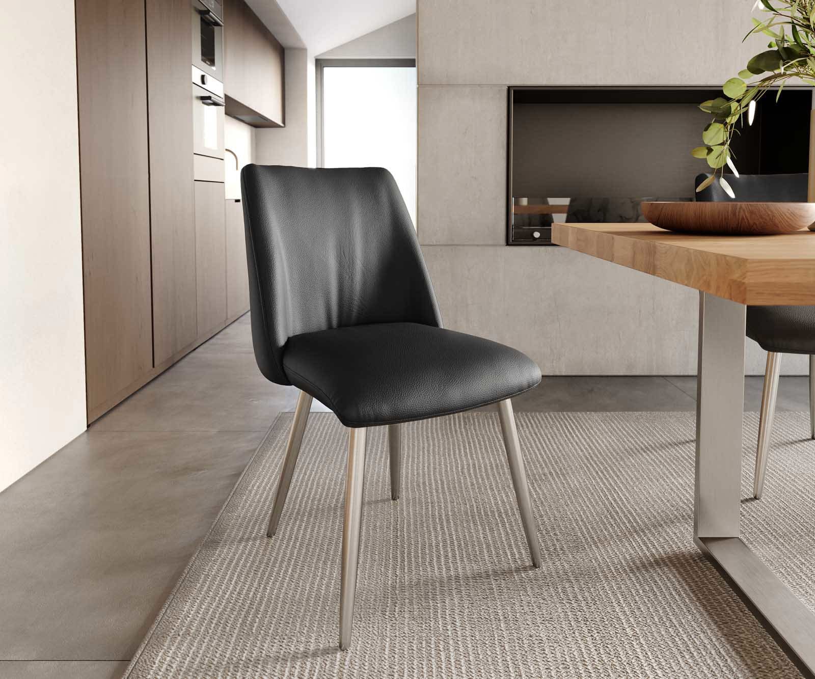 Chaise-de-salle-à-manger Elso-Flex cuir de vache noir 4 pieds coniques acier inoxydable brossé ressorts ensachés Chaise-de-salle-à-manger Elso-Flex cuir de vache noir 4 pieds coniques acier inoxydable brossé ressorts ensachés