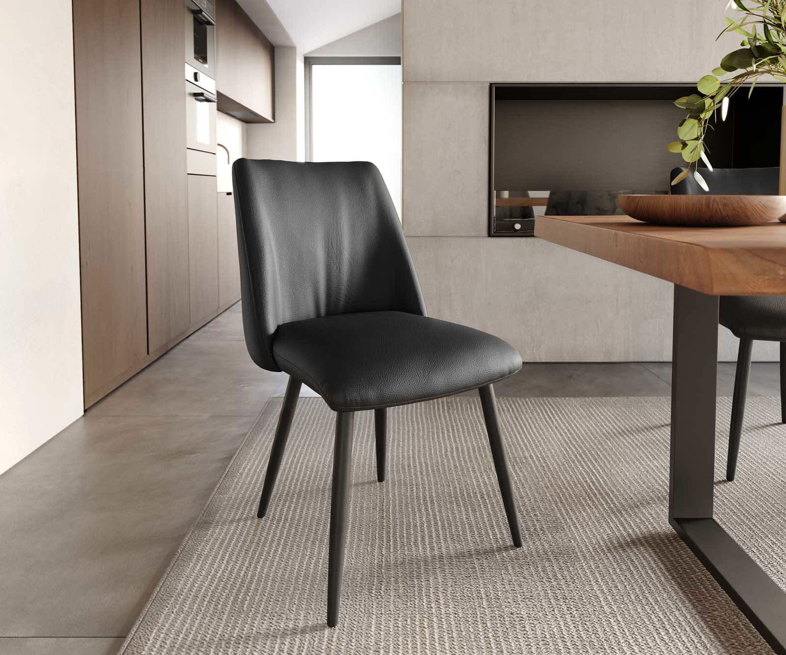 Chaise-de-salle-à-manger Elso-Flex cuir de vache noir 4 pieds coniques noir ressorts ensachés Chaise-de-salle-à-manger Elso-Flex cuir de vache noir 4 pieds coniques noir ressorts ensachés