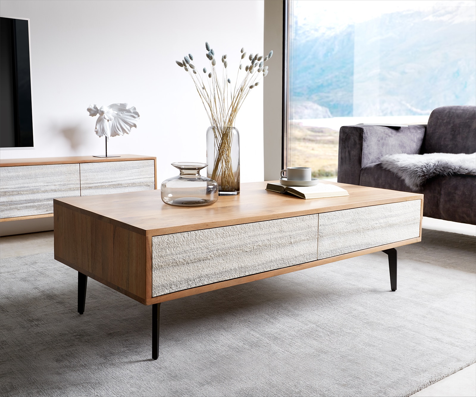 Table basse Kleo 115x60 cm acacia naturel 4 tiroirs pieds angulaires métal noir