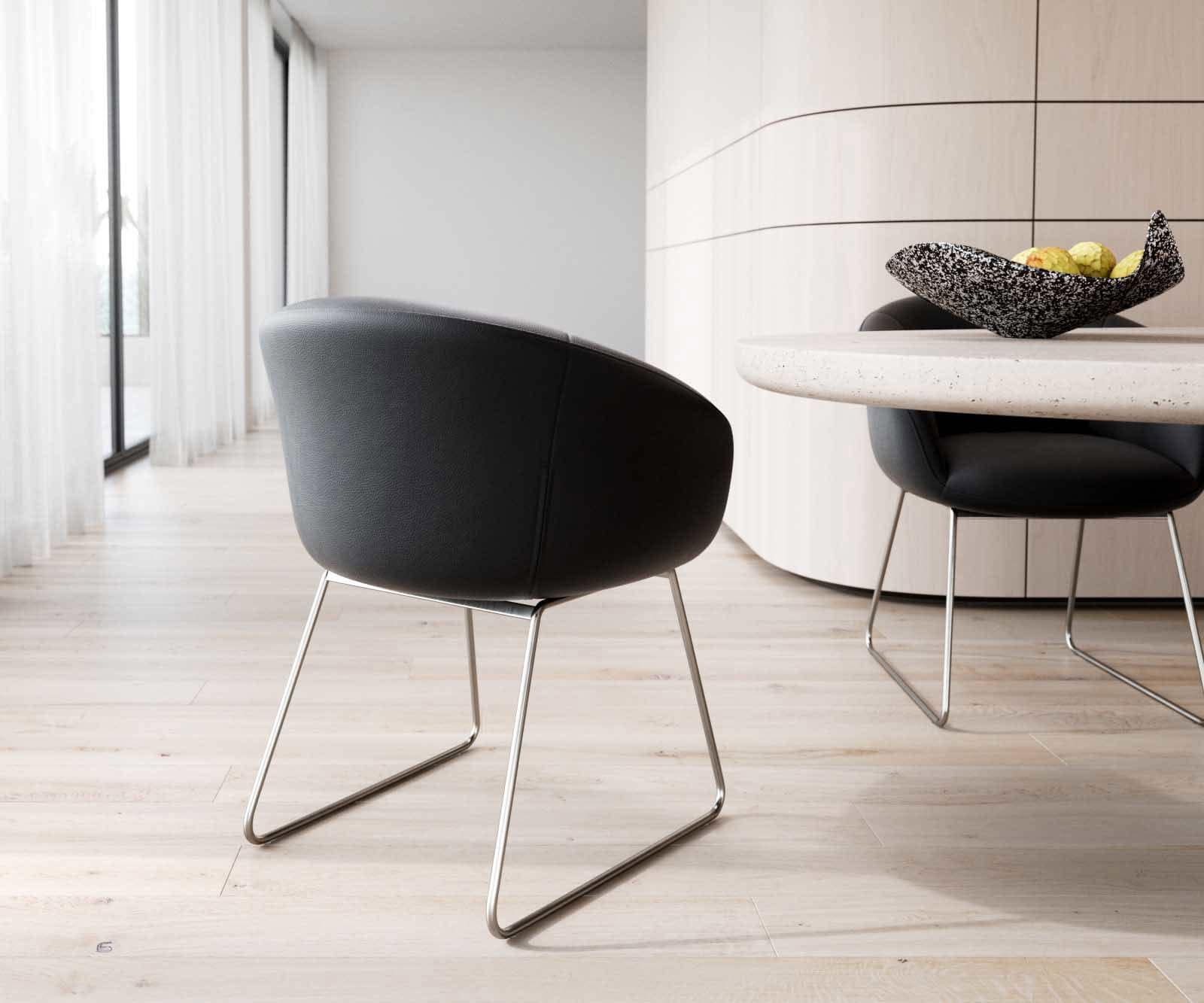 Chaise-de-salle-à-manger Vinka-Flex avec accoudoirs cuir de vache noir pied trapèze acier inoxydable brossé ressorts ensachés 4 Chaise-de-salle-à-manger Vinka-Flex avec accoudoirs cuir de vache noir pied trapèze acier inoxydable brossé ressorts ensachés 4