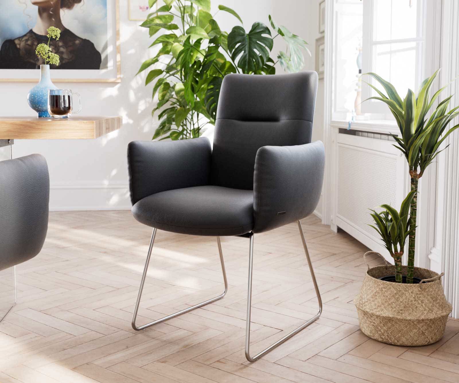 Chaise-de-salle-à-manger Jova-Flex avec accoudoirs cuir de vache noir pied trapèze acier inoxydable brossé ressorts ensachés