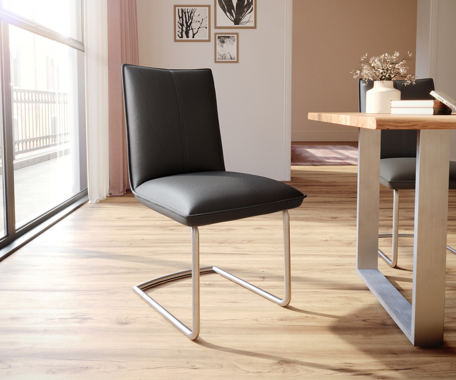Cantilever Lelio-Flex cuir de vache noir pied cantilever rond acier inoxydable brossé ressorts ensachés