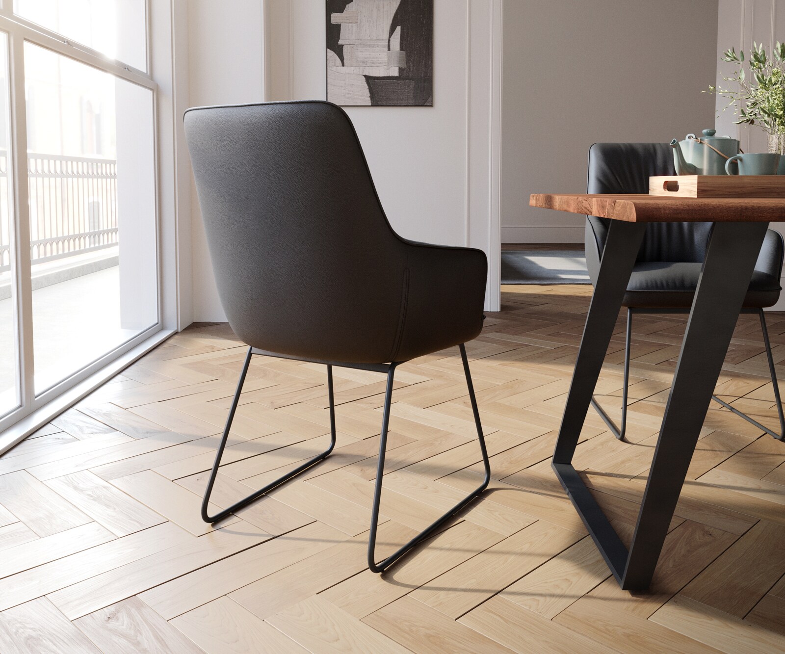 Chaise-de-salle-à-manger Zelia-Flex avec accoudoirs cuir de vache noir pied trapèze noir ressorts ensachés 4
