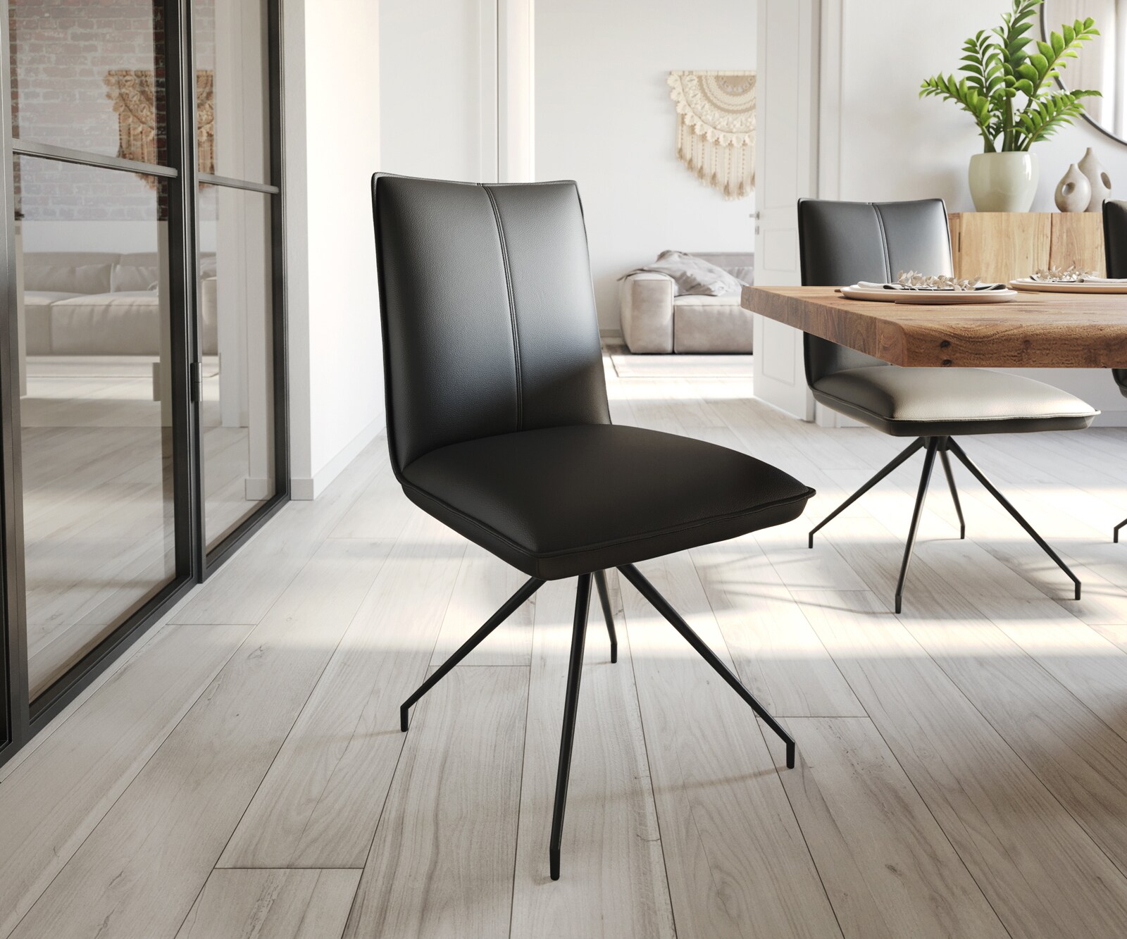 Chaise-de-salle-à-manger Lelio-Flex cuir de vache noir pied croisé conique noir ressorts ensachés