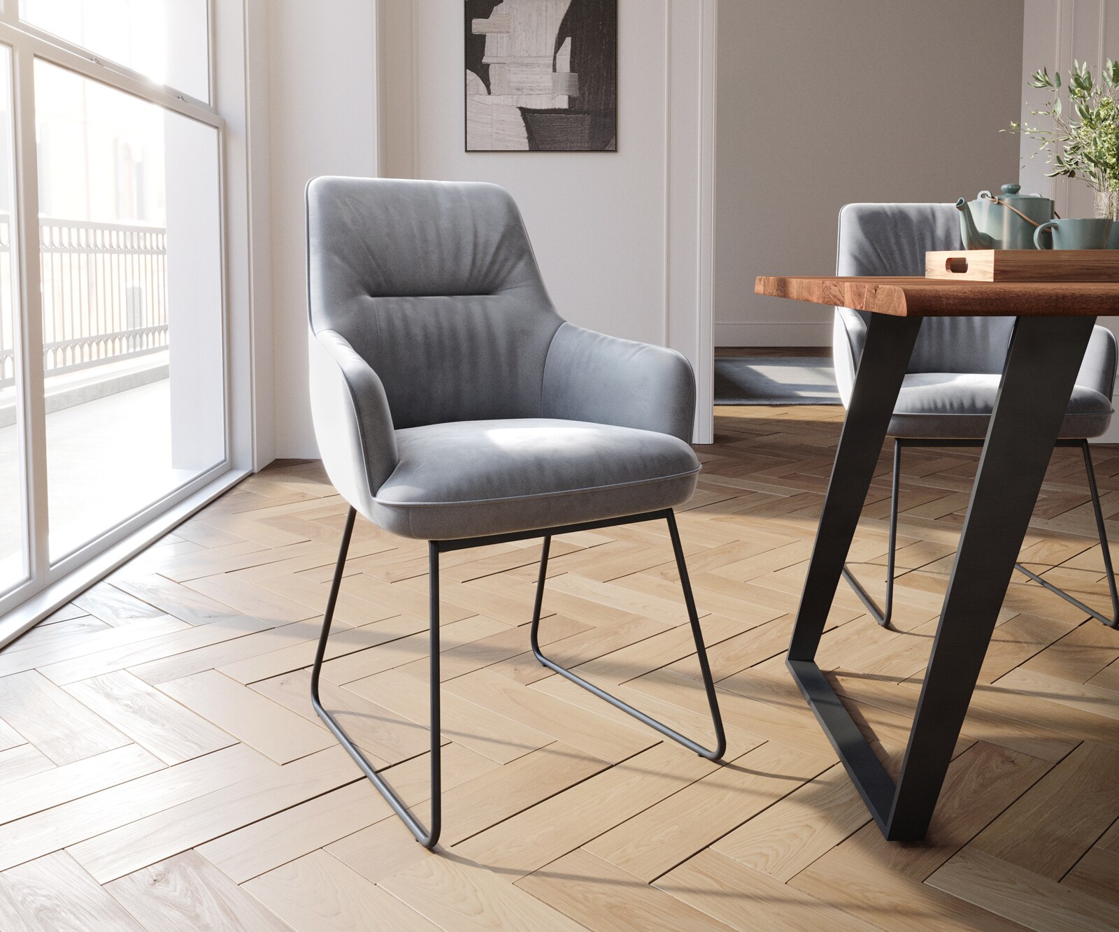 Chaise-de-salle-à-manger Zelia-Flex avec accoudoirs velours gris pied trapèze noir ressorts ensachés