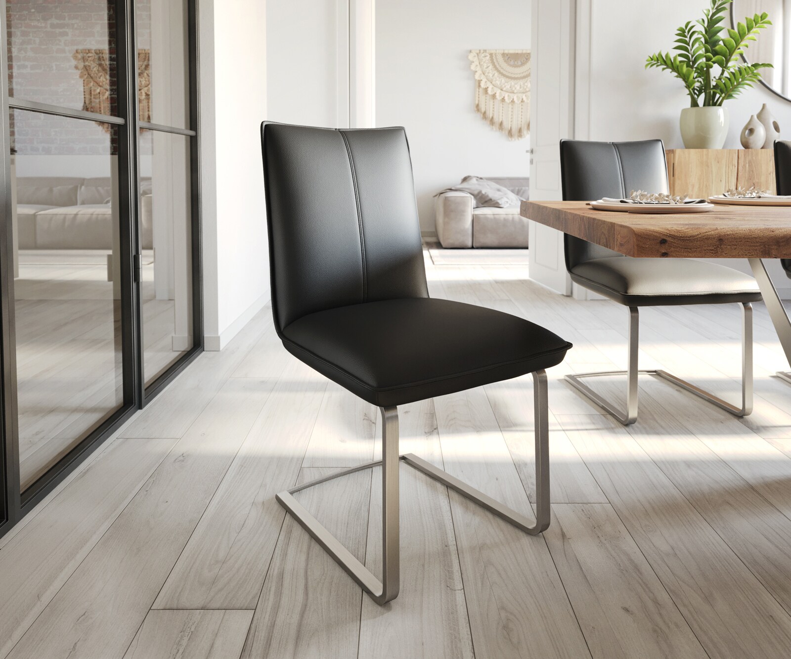 Cantilever Lelio-Flex cuir de vache noir pied cantilever plat acier inoxydable brossé ressorts ensachés