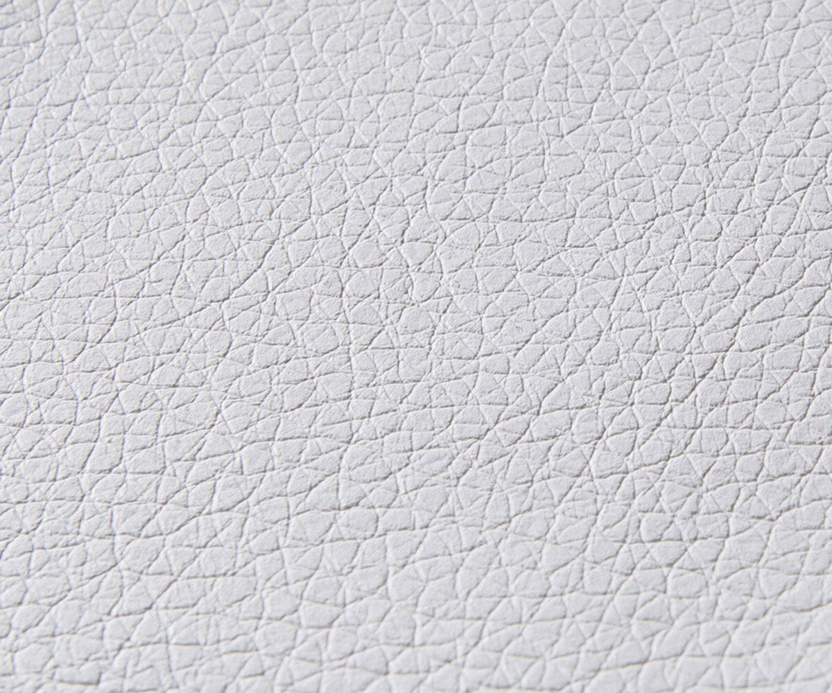 Canapé-panoramique Clovis XXL blanc noir avec tabouret et accoudoirs poufs gauche 2