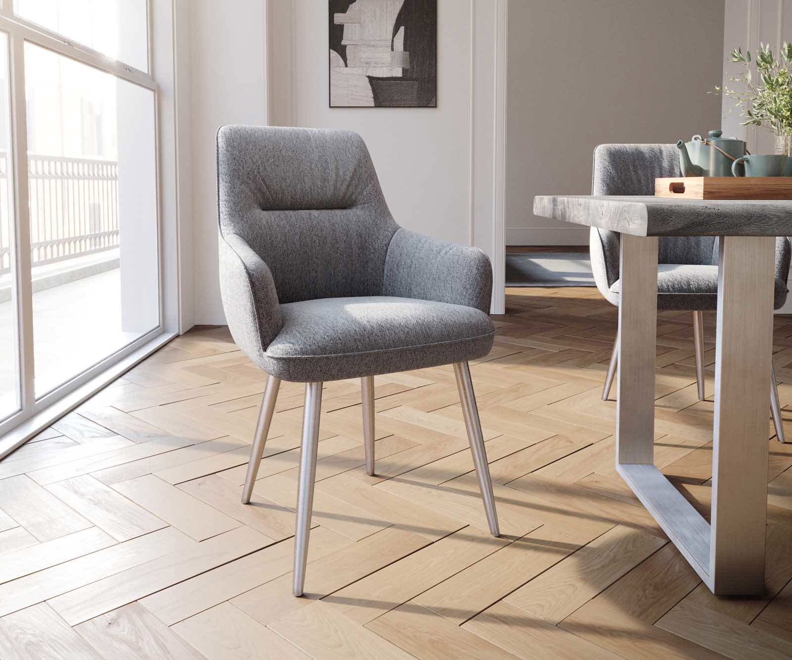 Chaise-de-salle-à-manger Zelia-Flex avec accoudoirs tissu texturé gris clair 4 pieds coniques acier inoxydable brossé ressorts ensachés