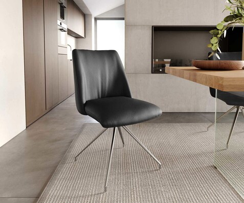 Chaise-pivotante Elso-Flex cuir de vache noir pied croisé conique acier inoxydable brossé pivotement sur 180° ressorts ensachés