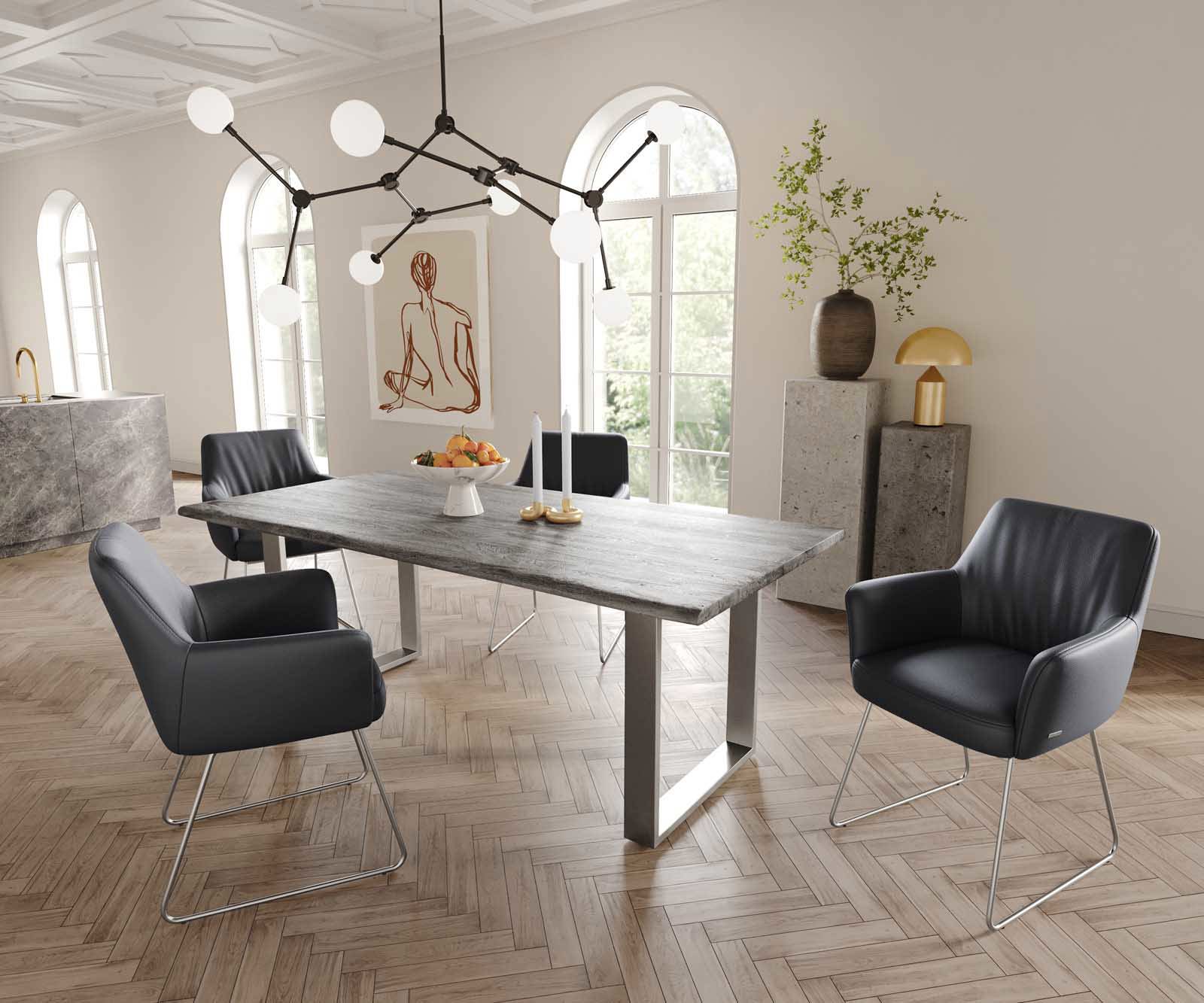 Chaise-de-salle-à-manger Xana-Flex avec accoudoirs cuir de vache noir pied trapèze acier inoxydable brossé ressorts ensachés 4