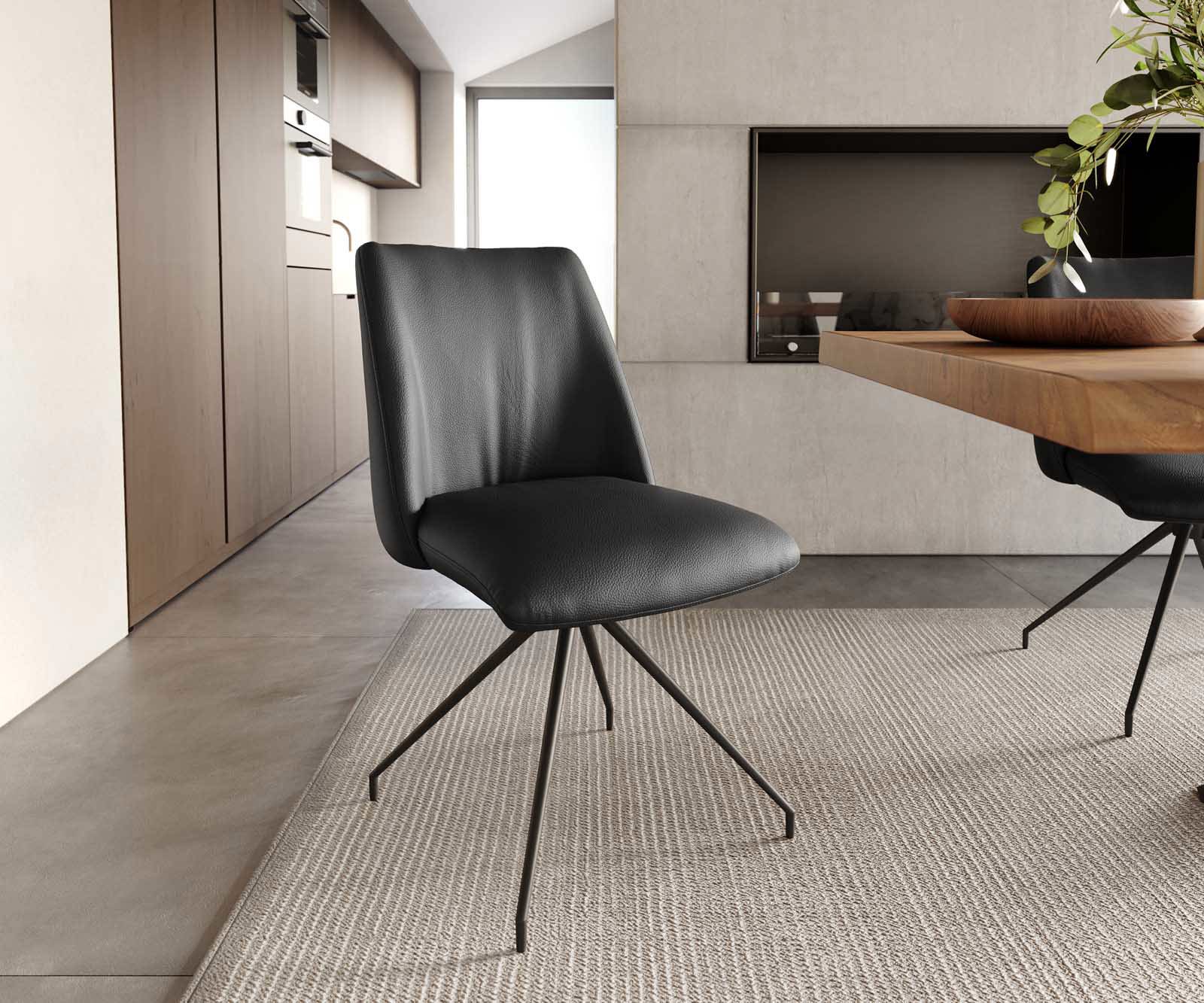 Chaise-pivotante Elso-Flex cuir de vache noir pied croisé conique noir pivotement sur 180° ressorts ensachés