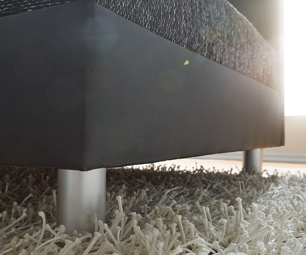 Canapé-panoramique Clovis XXL modulable noir avec tabouret et accoudoirs poufs droite 6