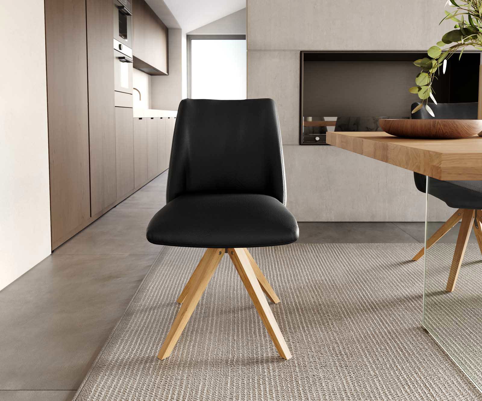 Chaise-pivotante Elso-Flex cuir de vache noir pied en bois angulaire naturel pivotement sur 180° ressorts ensachés 1