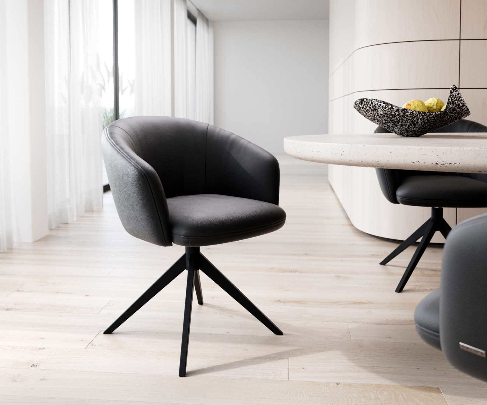 Chaise-pivotante Caja-Flex avec accoudoirs cuir de vache noir pied croisé large noir pivotement sur 360° ressorts ensachés