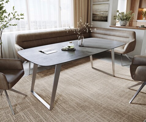 Table à manger Edge bateau 200x100 cm céramique béton gris inox incliné