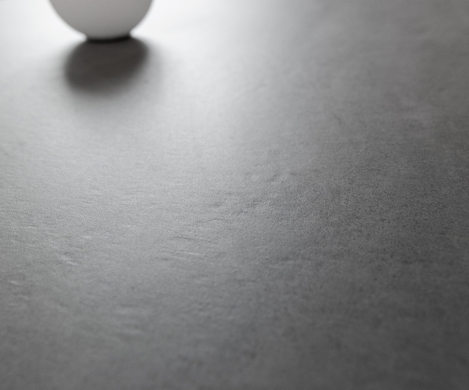 Table d’extérieur Edge bateau 200x100 cm céramique béton gris piètement croisé rectangulaire inox 5