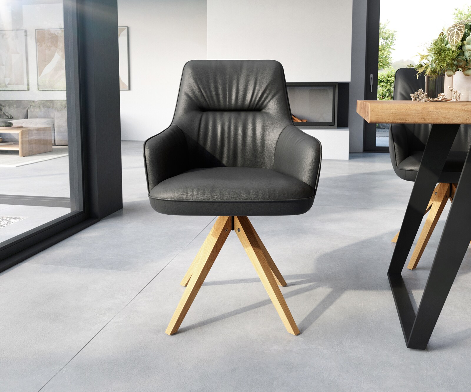 Chaise-de-salle-à-manger Zelia-Flex avec accoudoirs cuir de vache noir pied en bois angulaire naturel ressorts ensachés 1
