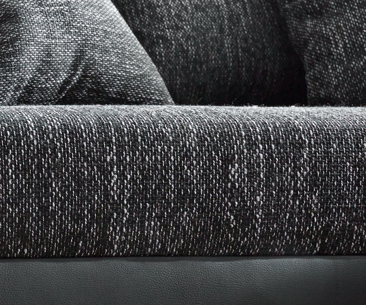 Canapé-panoramique Clovis XXL modulable noir avec tabouret et accoudoirs poufs droite 5