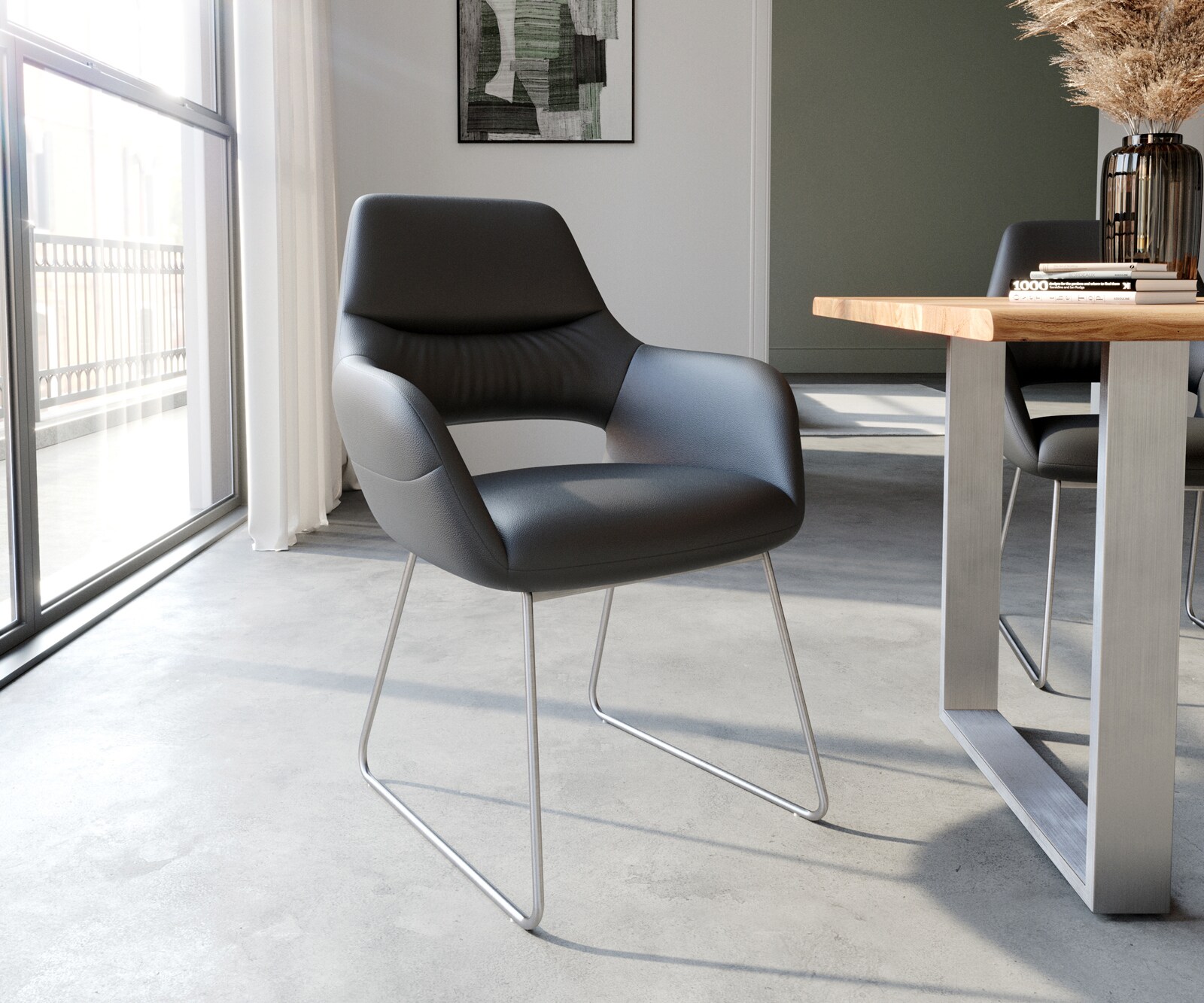 Chaise-de-salle-à-manger Yago-Flex avec accoudoirs cuir de vache noir pied trapèze acier inoxydable brossé ressorts ensachés